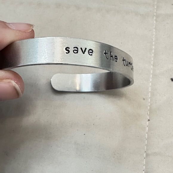 2/$15 Silver Tone “Save the Turtles” Cuff Bracelet - Picture 9 of 11